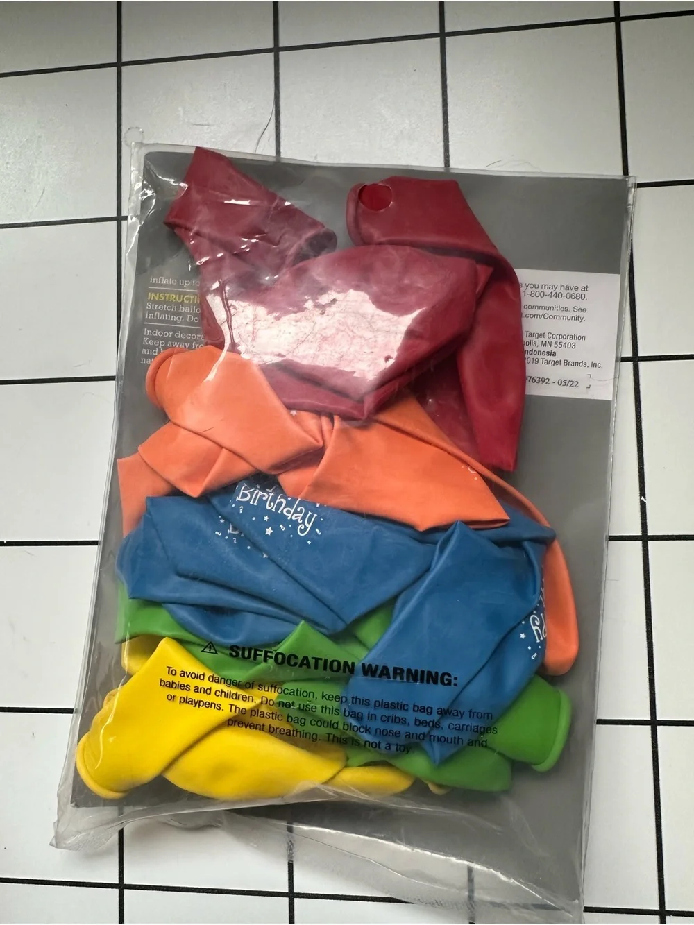 Colorful Birthday Bundle. 2 banners. 20 balloons. Candles spell HAPPY BIRTHDAY.